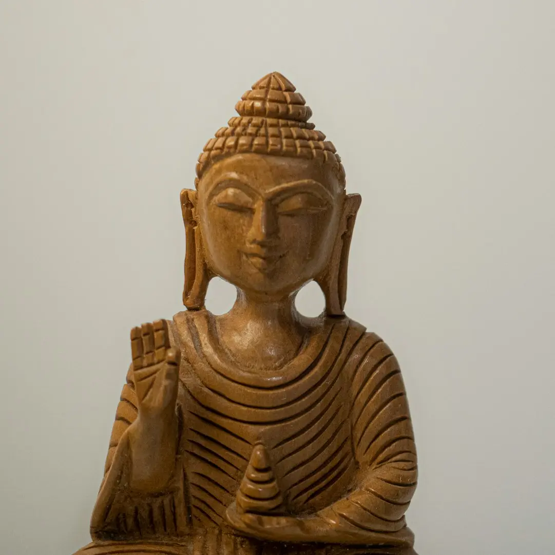 gold buddha statue during daytime